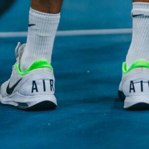 White and yellow Tennis Shoes